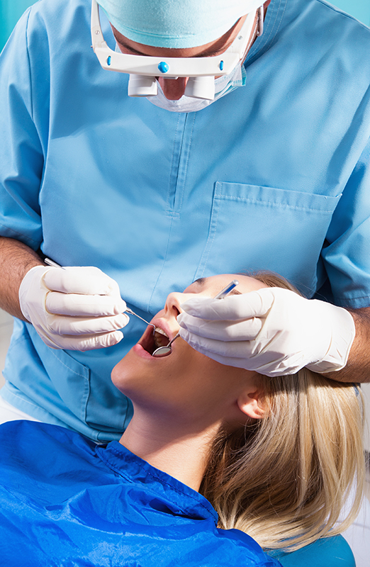 What is the difference between dentistry and OMS?